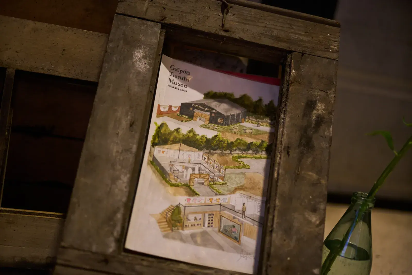 Framed watercolor of the estate's Galpón Tienda Museo project